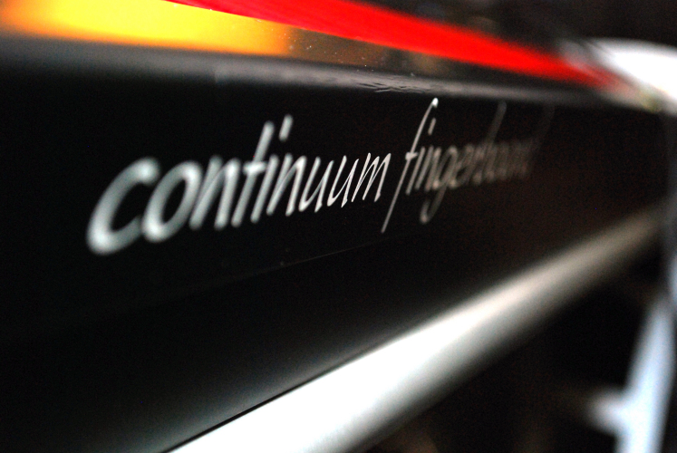 Continuum_Fingerboard-logo